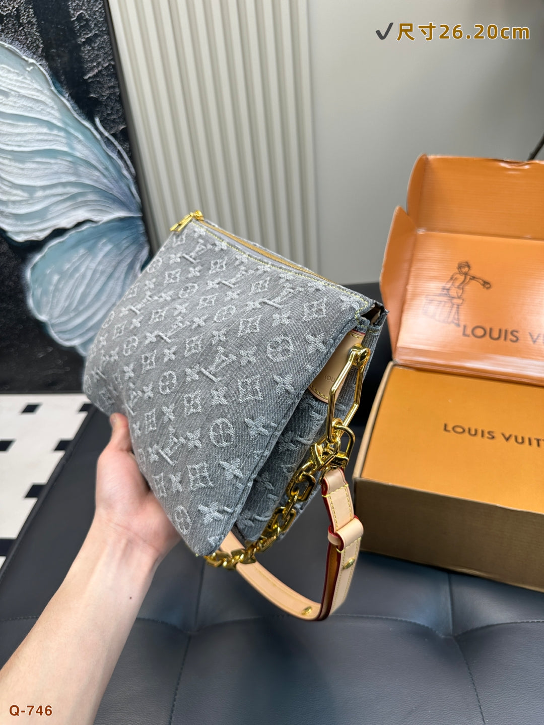 The LV Coussin Denim Accordion Bag