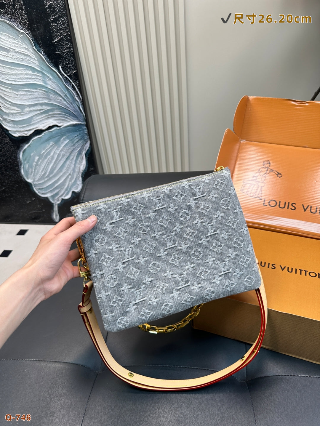 The LV Coussin Denim Accordion Bag