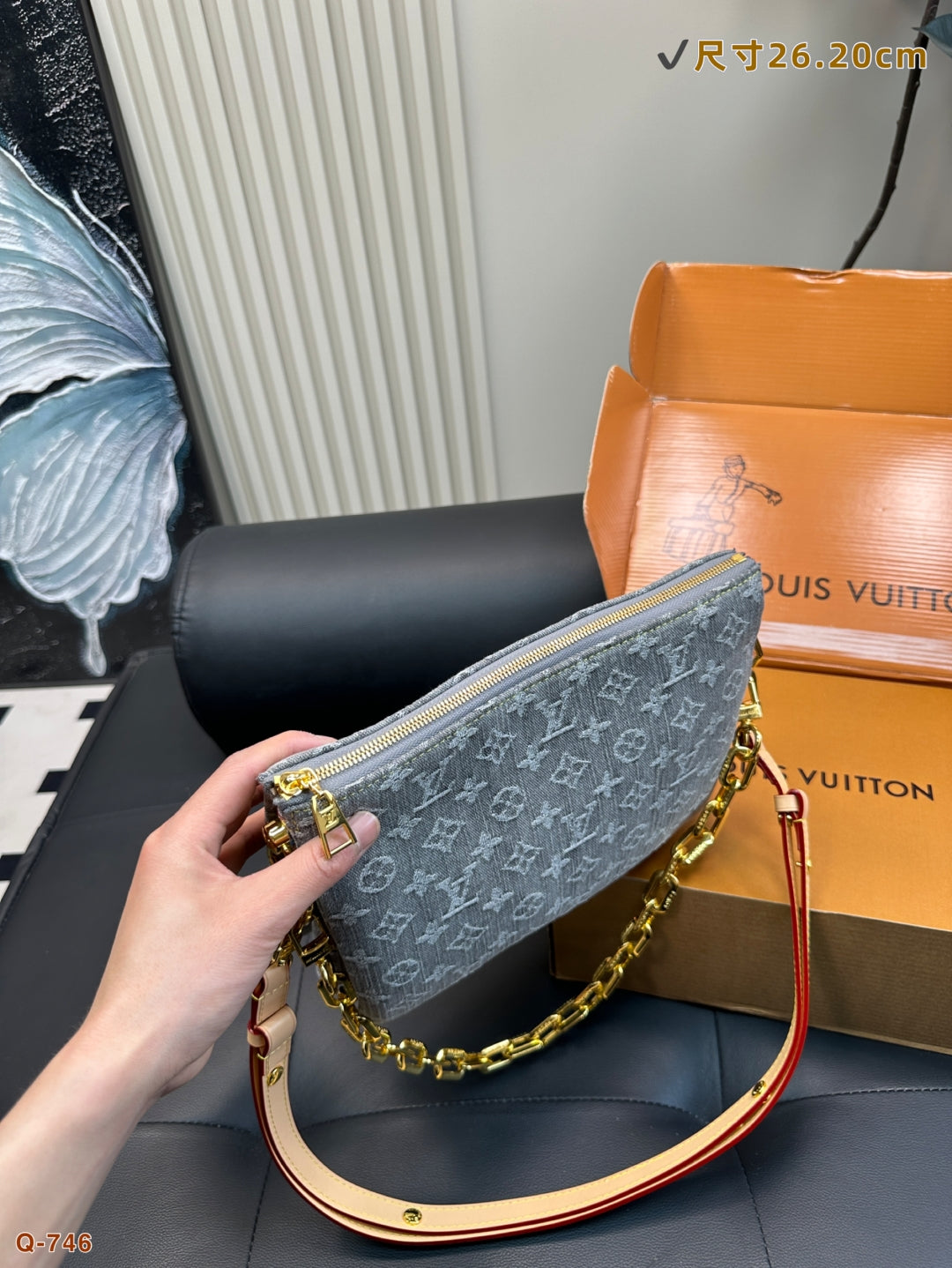 The LV Coussin Denim Accordion Bag