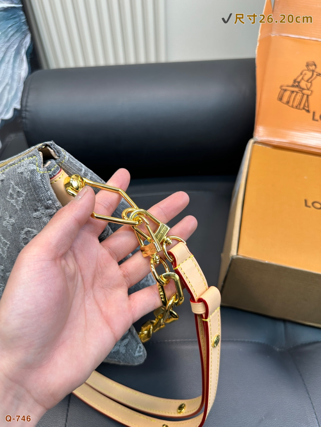 The LV Coussin Denim Accordion Bag