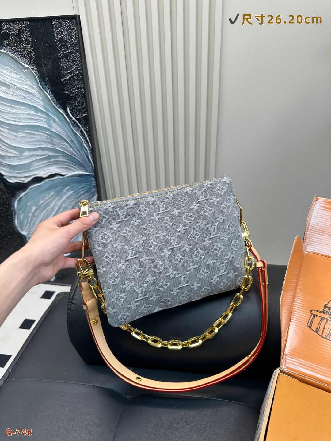 The LV Coussin Denim Accordion Bag