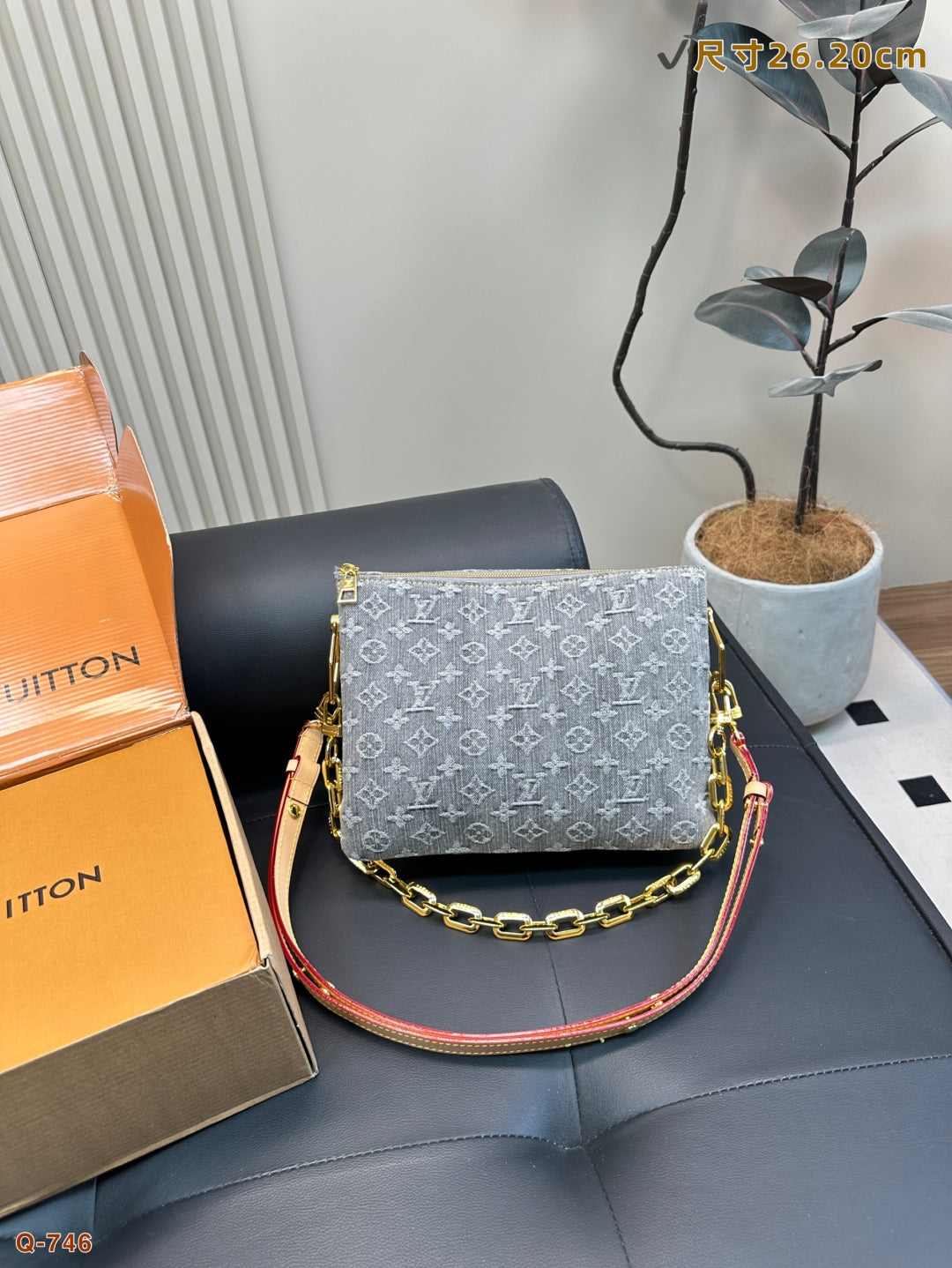 The LV Coussin Denim Accordion Bag