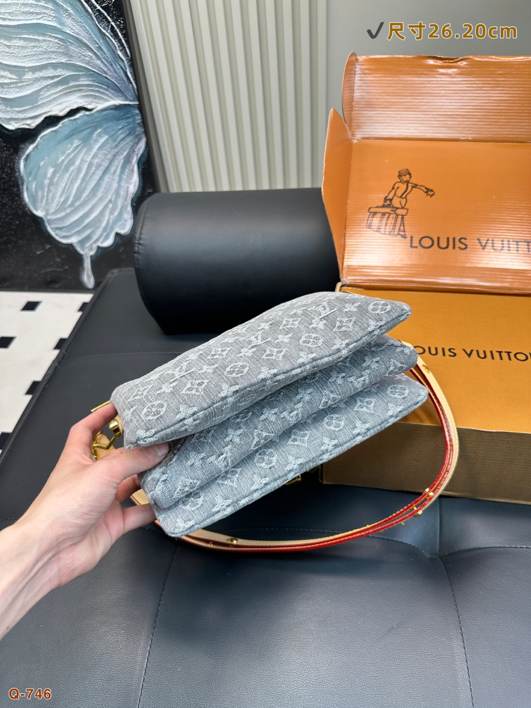 The LV Coussin Denim Accordion Bag