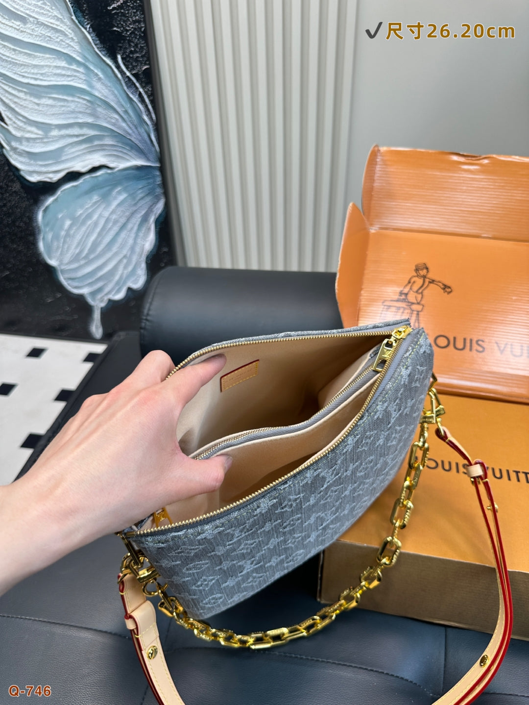 The LV Coussin Denim Accordion Bag