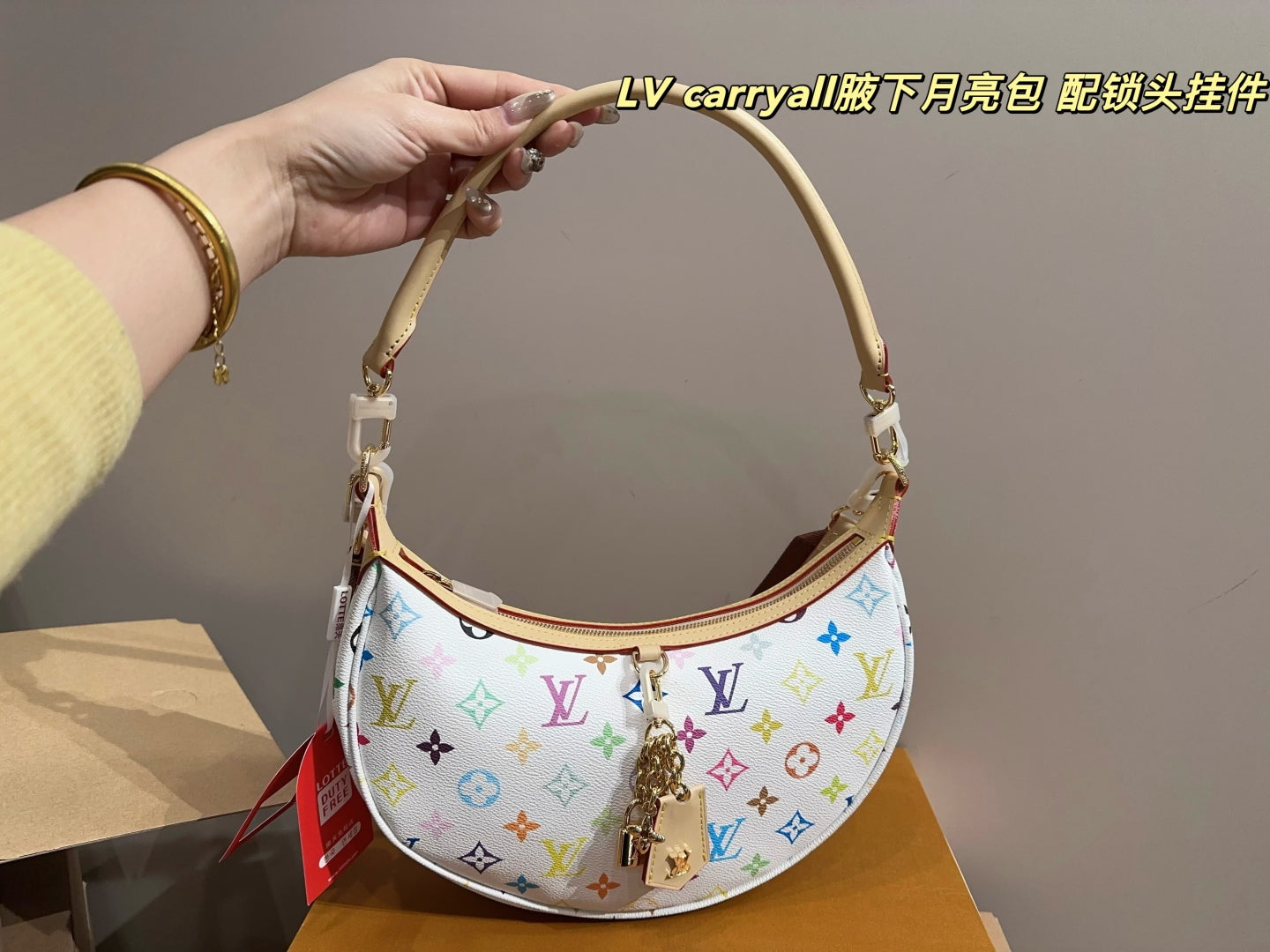 LV Carryall Crescent Bag
