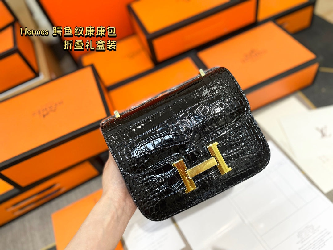 Crocodile-print Hermès Constace Concan bag.