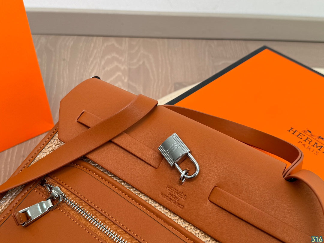 Hermès woven handbag