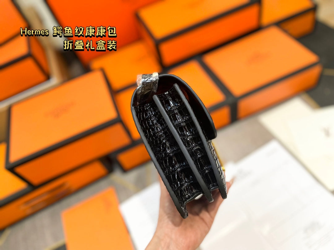 Crocodile-print Hermès Constace Concan bag.