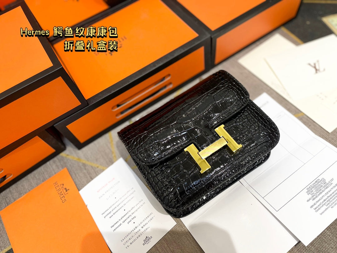 Crocodile-print Hermès Constace Concan bag.