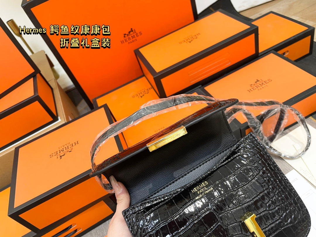 Crocodile-print Hermès Constace Concan bag.