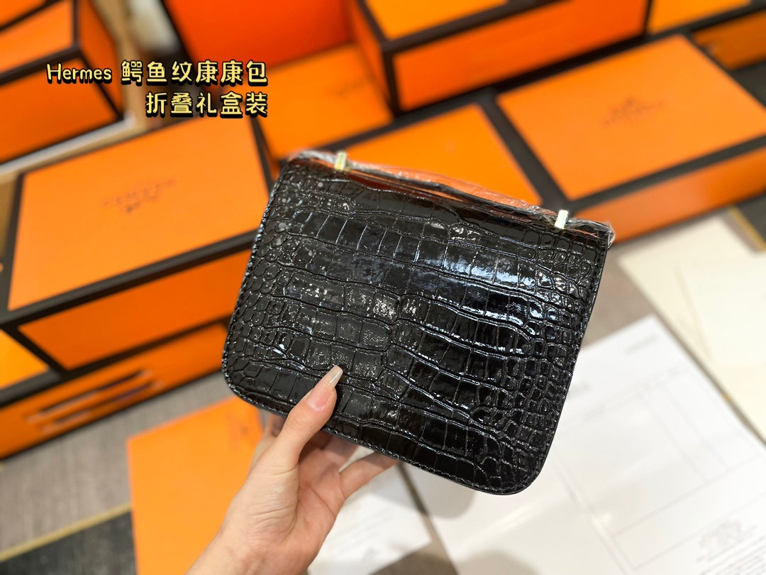 Crocodile-print Hermès Constace Concan bag.