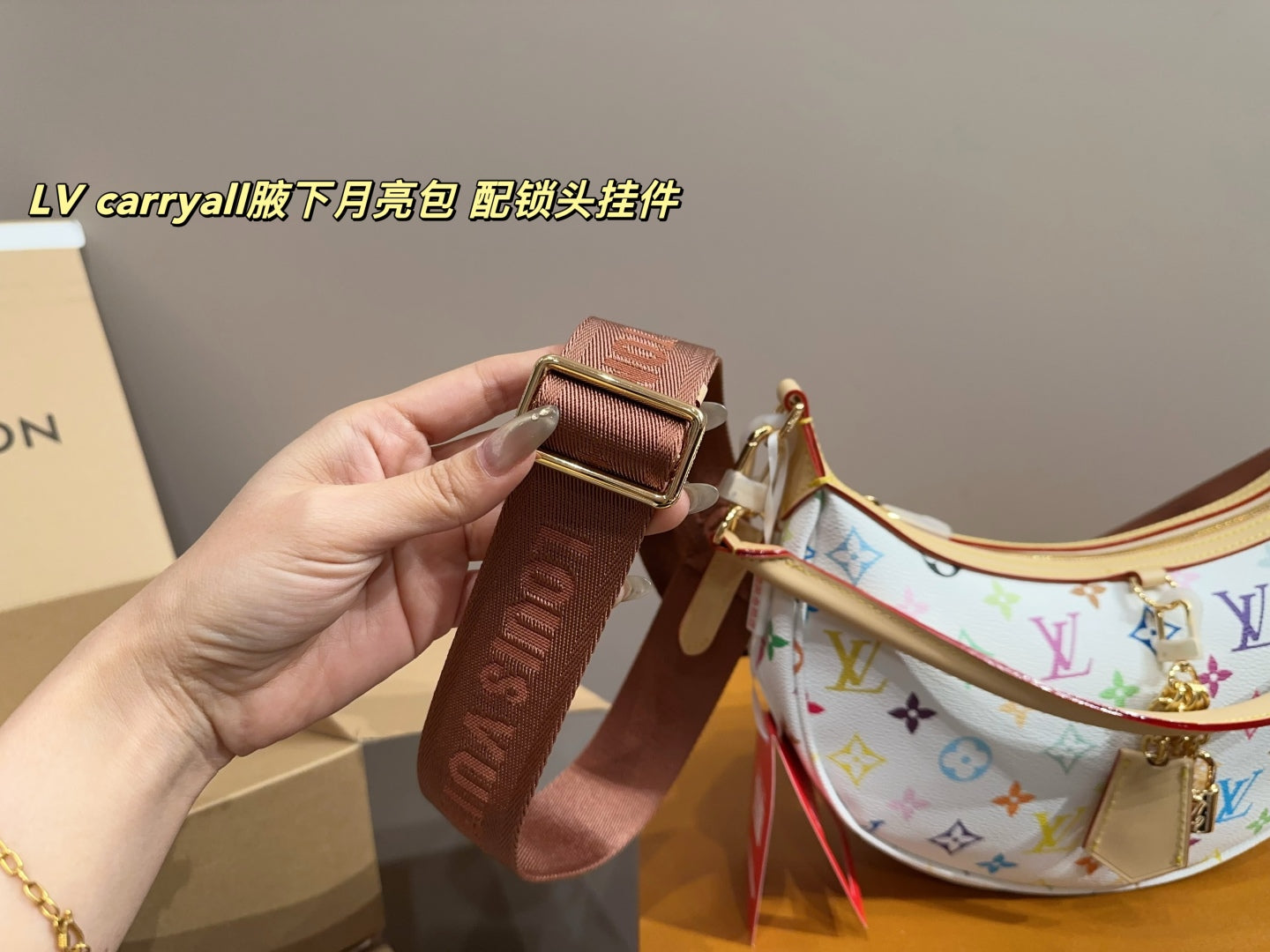 LV Carryall Crescent Bag