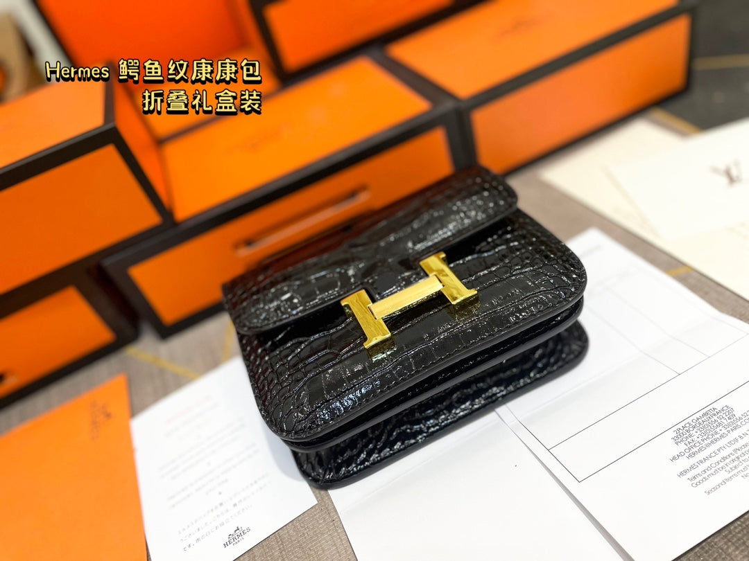 Crocodile-print Hermès Constace Concan bag.