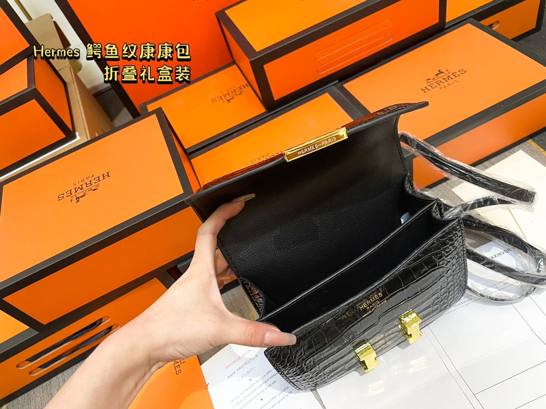 Crocodile-print Hermès Constace Concan bag.