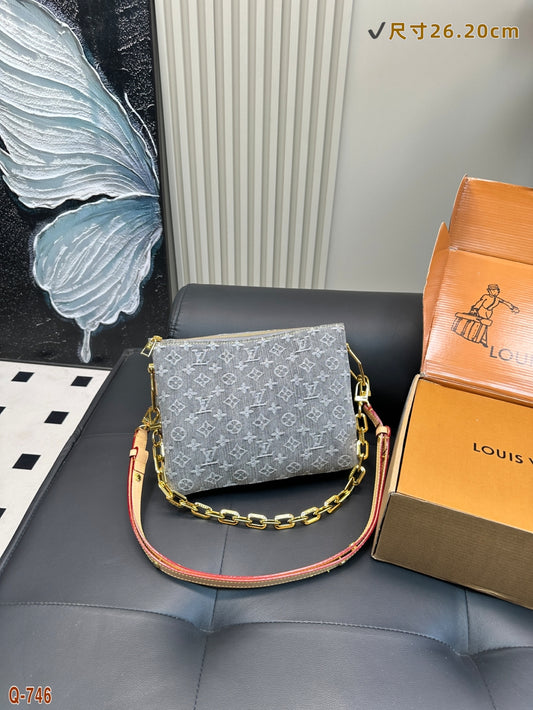The LV Coussin Denim Accordion Bag
