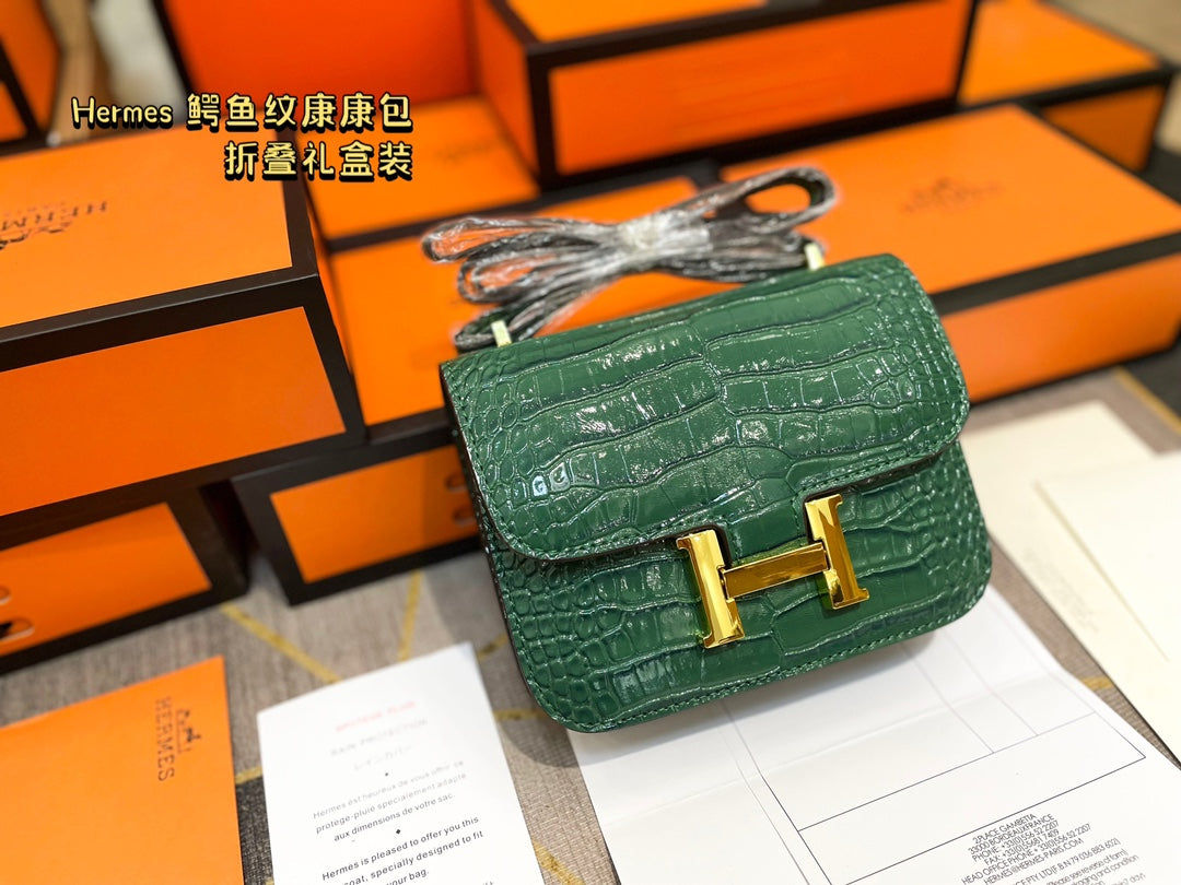 Crocodile-print Hermès Constace Concan bag.