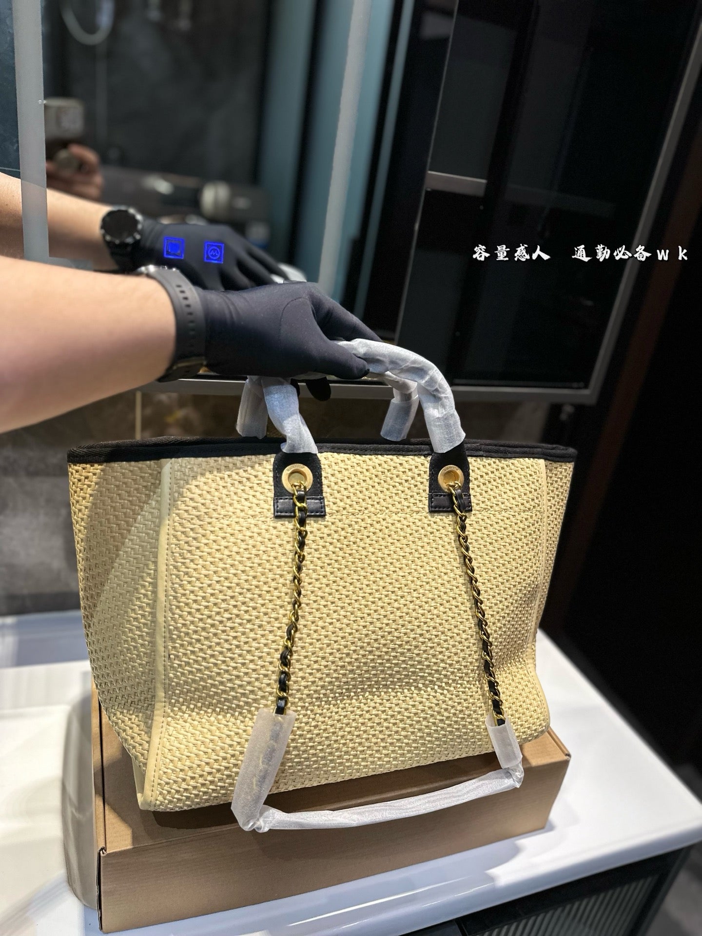 CHANEL's new spring/summer straw beach bag.