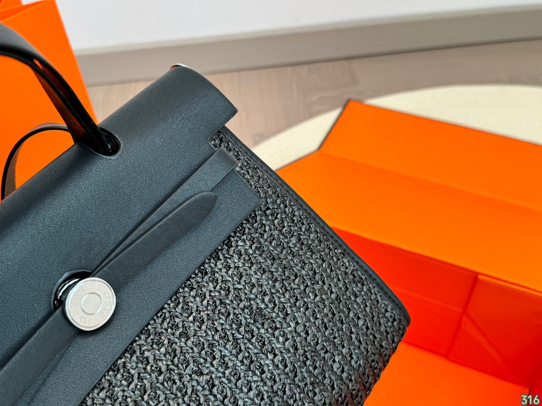 Hermès woven handbag