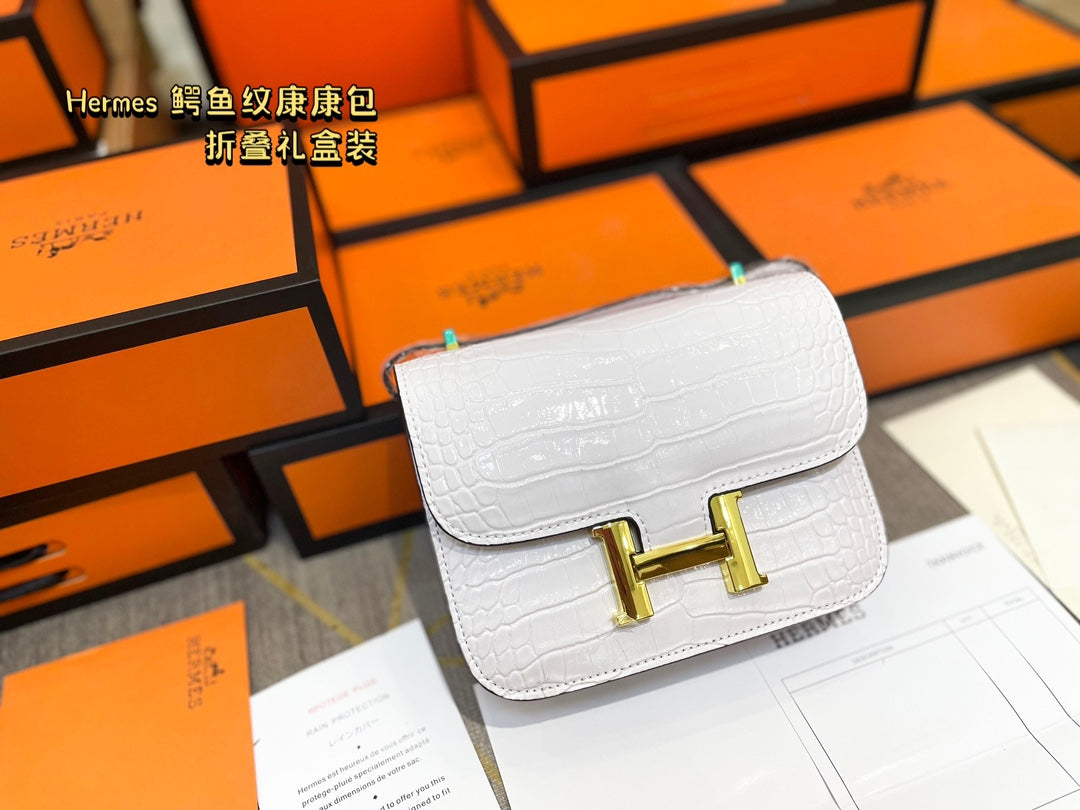 Crocodile-print Hermès Constace Concan bag.