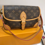 The Louis Vuitton Diane Baguette Handbag