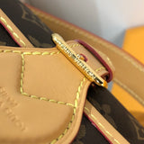 The Louis Vuitton Diane Baguette Handbag