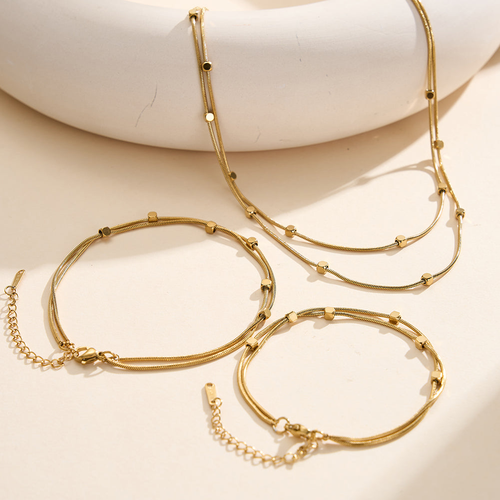 Oracle Lumina // Double-Layer Fluid Snake Chain & Disc Choker