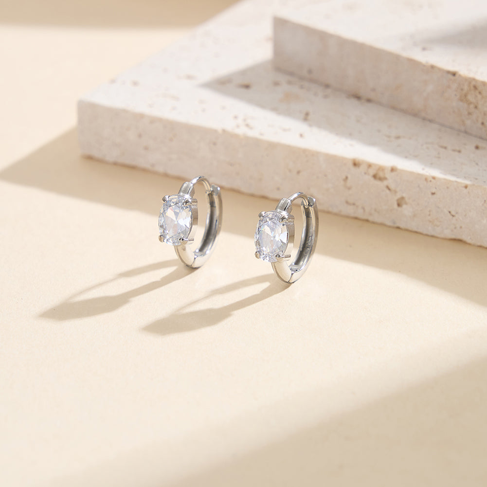 Velvet Rhythm // Solitaire Oval-Cut CZ Huggie Earrings
