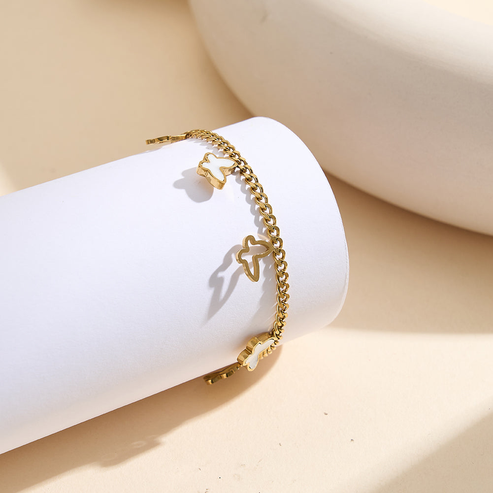 Aura Celestial gold lucky butterfly charm bracelet with natural white shell mother of pearl and open-work hollow geometric butterflies in waterproof 304 stainless steel by LeeWey Luxury