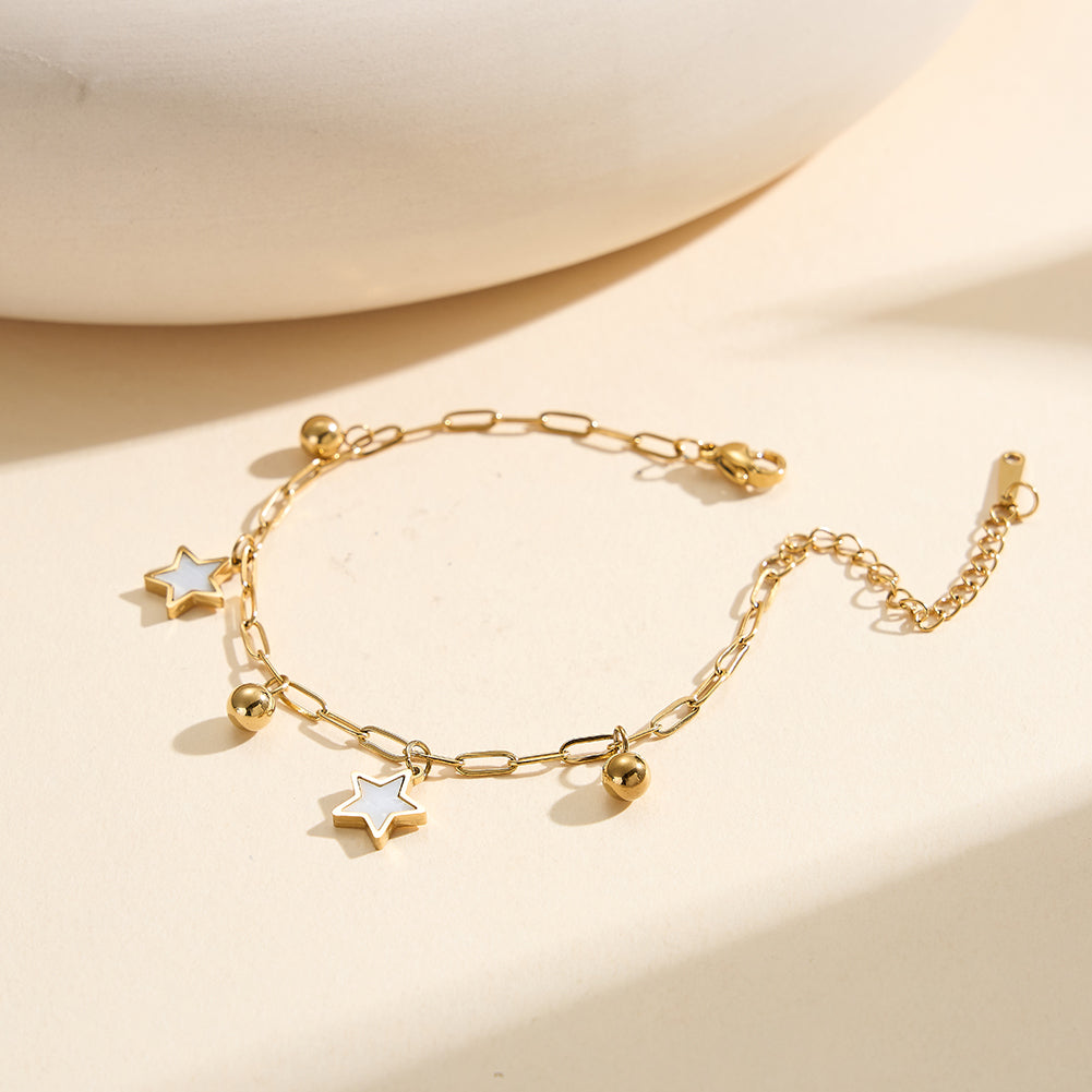 Aura Celestial gold lucky star charm bracelet with natural white shell mother of pearl and polished metallic bead accents in waterproof 304 stainless steel by LeeWey Luxury