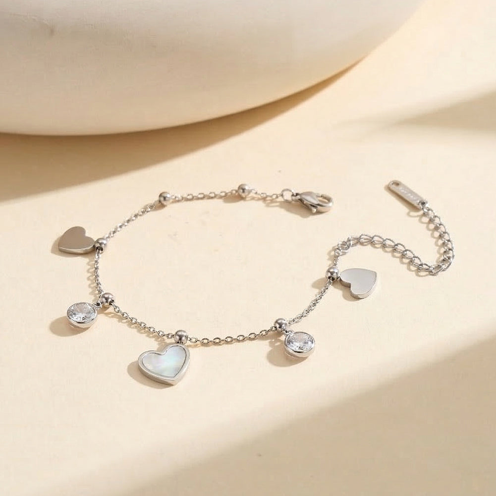 Aura Amour gold mixed charm bracelet with 12mm natural white shell mother of pearl heart round cubic zirconia crystals and polished metal hearts in waterproof 304 stainless steel by LeeWey Luxury