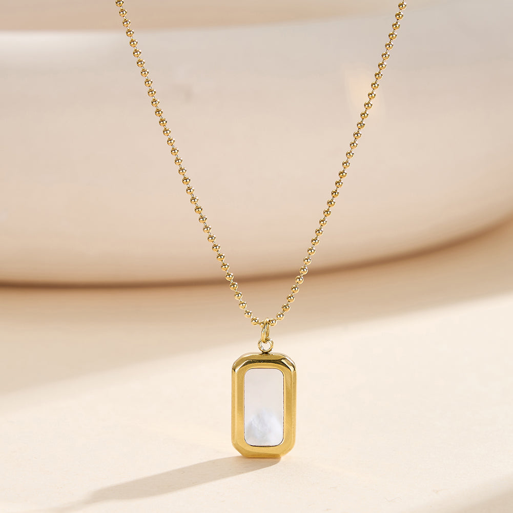 Velvet Meridian gold geometric rounded rectangular rectangular mini tag pendant necklace with inlaid natural white shell mother of pearl and bead accent chain in waterproof tarnish-free 304 stainless steel by LeeWey Luxury