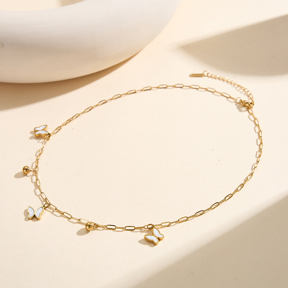 Aura Celestial gold lucky butterfly paperclip charm necklace with natural white shell mother of pearl and polished metallic bead accents in waterproof 304 stainless steel by LeeWey Luxury