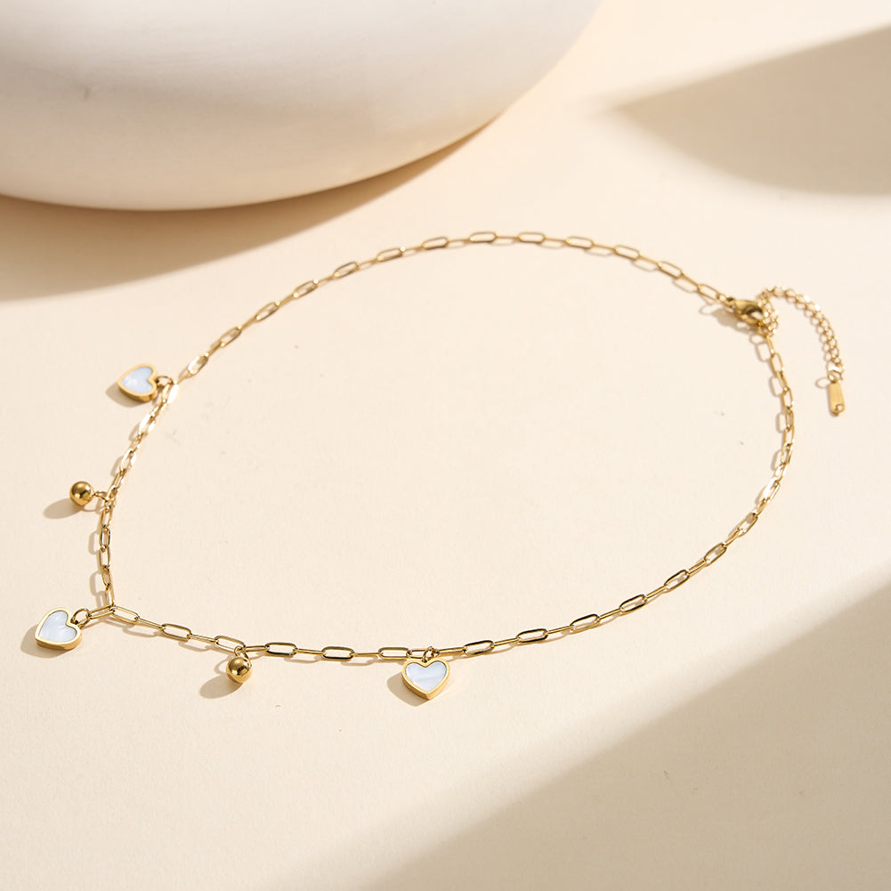 Aura Amour gold lucky heart paperclip charm necklace with natural white shell mother of pearl and polished metallic bead accents in waterproof 304 stainless steel by LeeWey Luxury