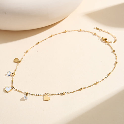 Aura Amour gold mixed charm necklace with 12mm natural white shell mother of pearl heart round cubic zirconia crystals and polished metal hearts in waterproof 304 stainless steel by LeeWey Luxury
