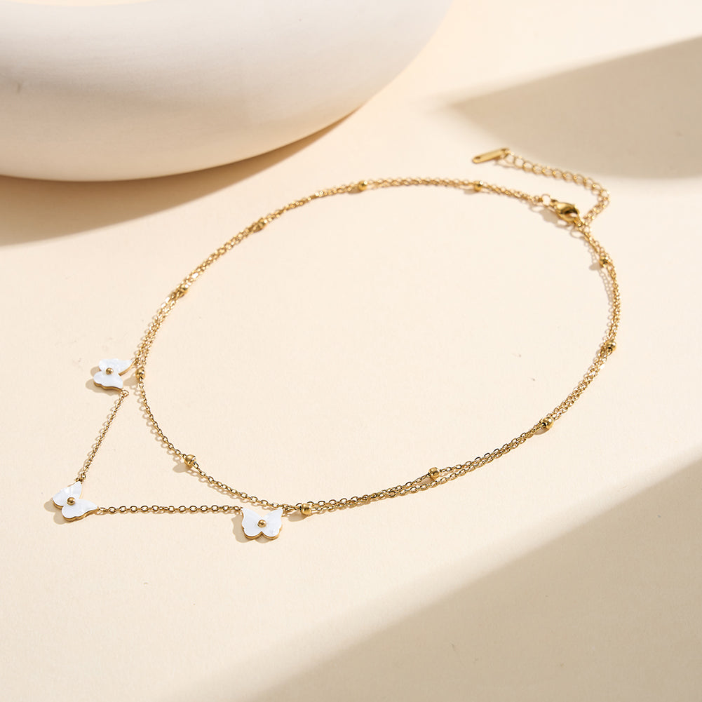 Aura Celestial gold double-layer layered hybrid necklace with 9mm natural white shell mother of pearl butterflies and bead accent chain in waterproof 304 stainless steel by LeeWey Luxury