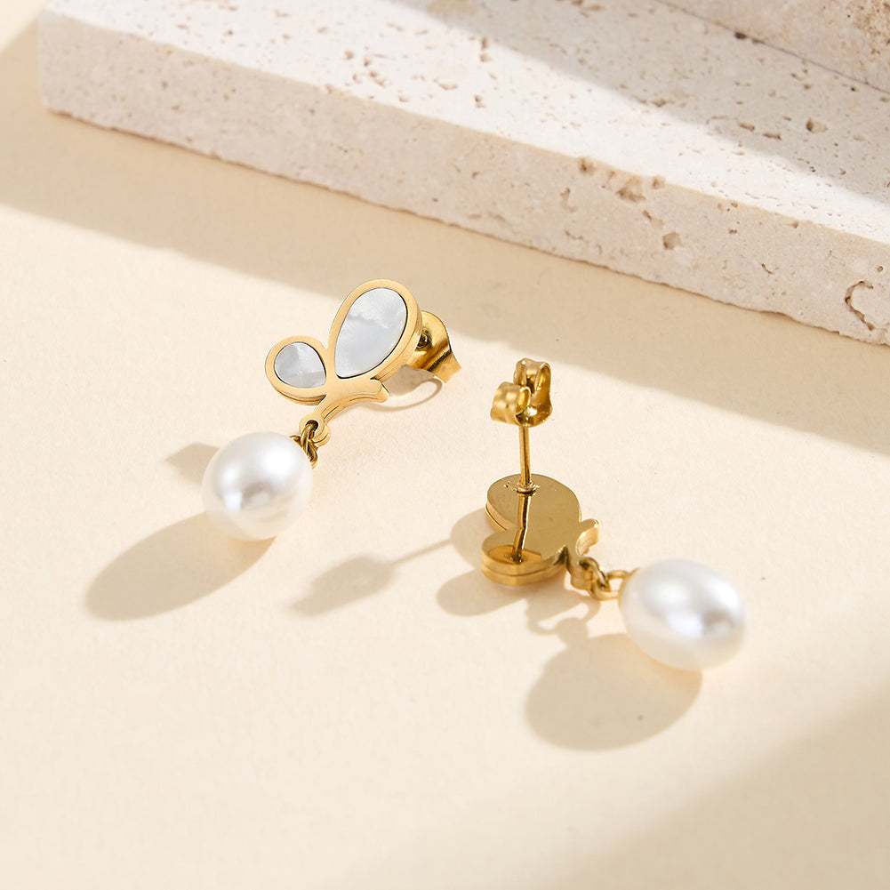 Aura Celestial gold butterfly line art drop earrings with inlaid natural white shell mother of pearl and dangling waterdrop shell pearl in waterproof 304 stainless steel by LeeWey Luxury